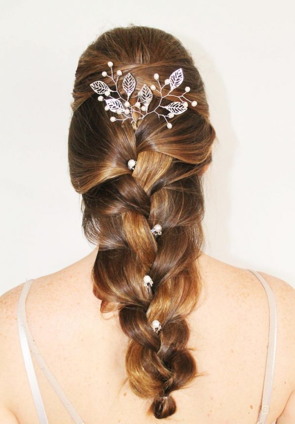 braided hairstyle with leaf hair pins