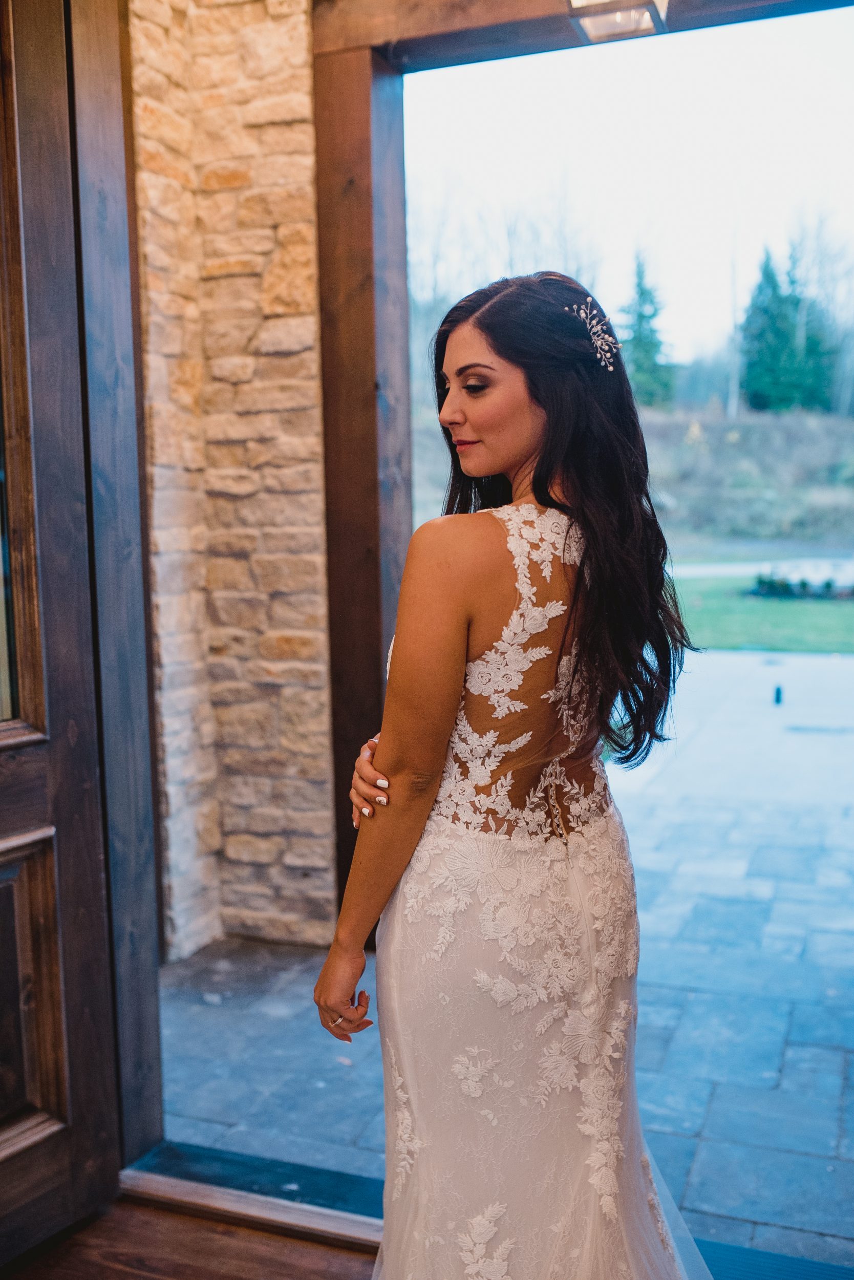 down wedding hairstyle with white hair pieces