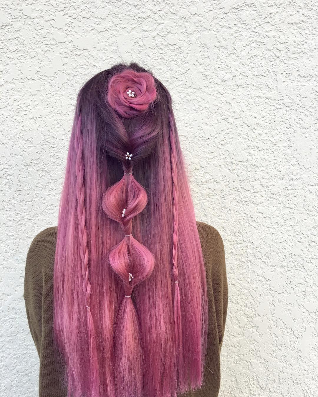 pink hairstyle inspiration with flower pins